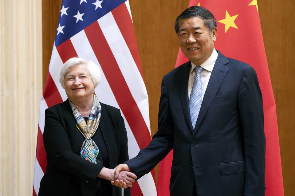 FILE - Treasury Secretary Janet Yellen, left, shakes hands with Chinese Vice Premier He Lifeng during a meeting at the Diaoyutai State Guesthouse in Beijing, China on July 8, 2023. (AP Photo/Mark Schiefelbein, Pool, File)