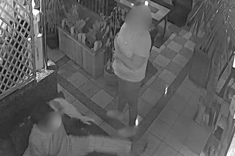 A grab from CCTV showing a woman and child