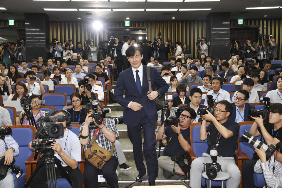 In this Sept. 2, 2019 photo, Cho Kuk, a nominee for South Korea's Justice Minister, arrives for a news conference at National Assembly in Seoul, South Korea. South Korean reporters have grilled President Moon Jae-in's nominee as justice minister for 11 hours over suspected ethical lapses surrounding his family that have triggered an intense political row and cut into Moon's popularity ratings. (Kim Ju-hyung/Yonhap via AP)