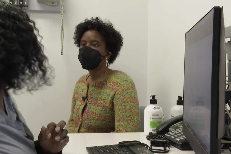 Jazmin Evans, a student at Temple University, meets with a doctor at Jefferson Health in Philadelphia on Feb. 16, 2024. Evans had been waiting for a new kidney for four years when her hospital revealed shocking news: She should have been put on the transplant list in 2015 instead of 2019 — and a racially biased organ test was to blame. (AP Photo/Tassanee Vejpongsa)