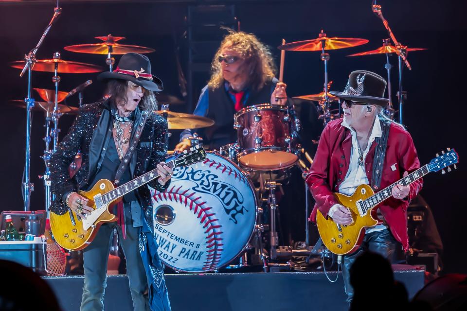 Joe Perry, John Douglas and Brad Whitford of Aerosmith perform on Thursday, Sept. 8, 2022, at Fenway Park in Boston.