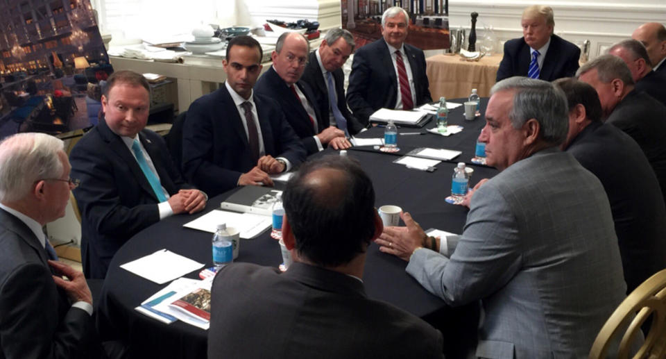 In this photo from Donald Trump’s Twitter account, George Papadopoulos, third from left, sits at a table with then-candidate Trump and others at what is labeled at a national security meeting in Washington that was posted on March 31, 2016. (Photo via AP)