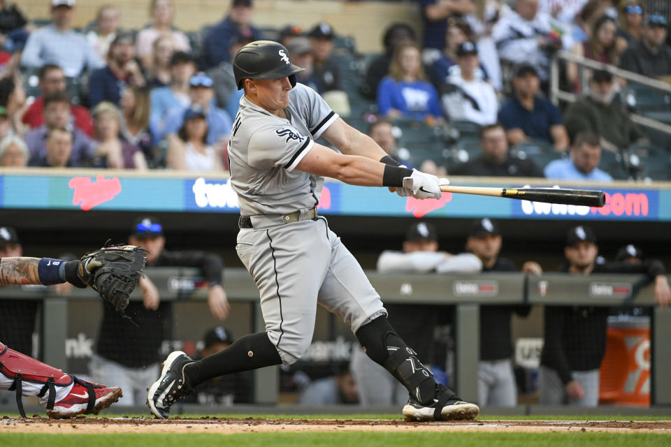 Chicago White Sox's Andrew Vaughn hits a two-run double off Minnesota Twins pitcher Pablo Lopez during the first inning of a baseball game Tuesday, April 11, 2023, in Minneapolis. (AP Photo/Craig Lassig)