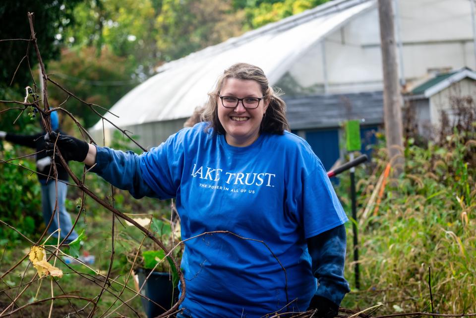 Employees from Lake Trust Credit Union participate in the company's annual Powered by Good Day.