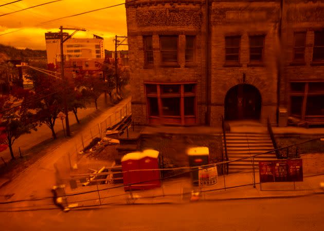 The Braddock Carnegie Library, seen through the stained-glass windows of the Braddock community center. (Photo: Nate Smallwood for HuffPost)