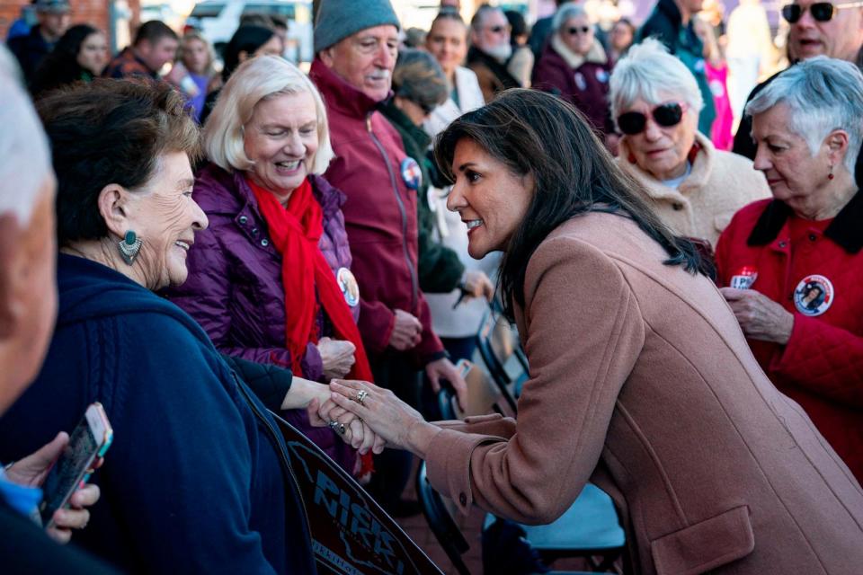 PHOTO: Republican presidential hopeful and former UN Ambassador Nikki Haley greets supporters at a campaign event in Bamberg Veterans Park, Feb. 13, 2024, in Bamberg, S.C. (Allison Joyce/AFP via Getty Images)