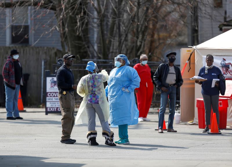 FILE PHOTO: People wait in line to receive testing during the global outbreak of coronavirus disease (COVID-19) in Chicago