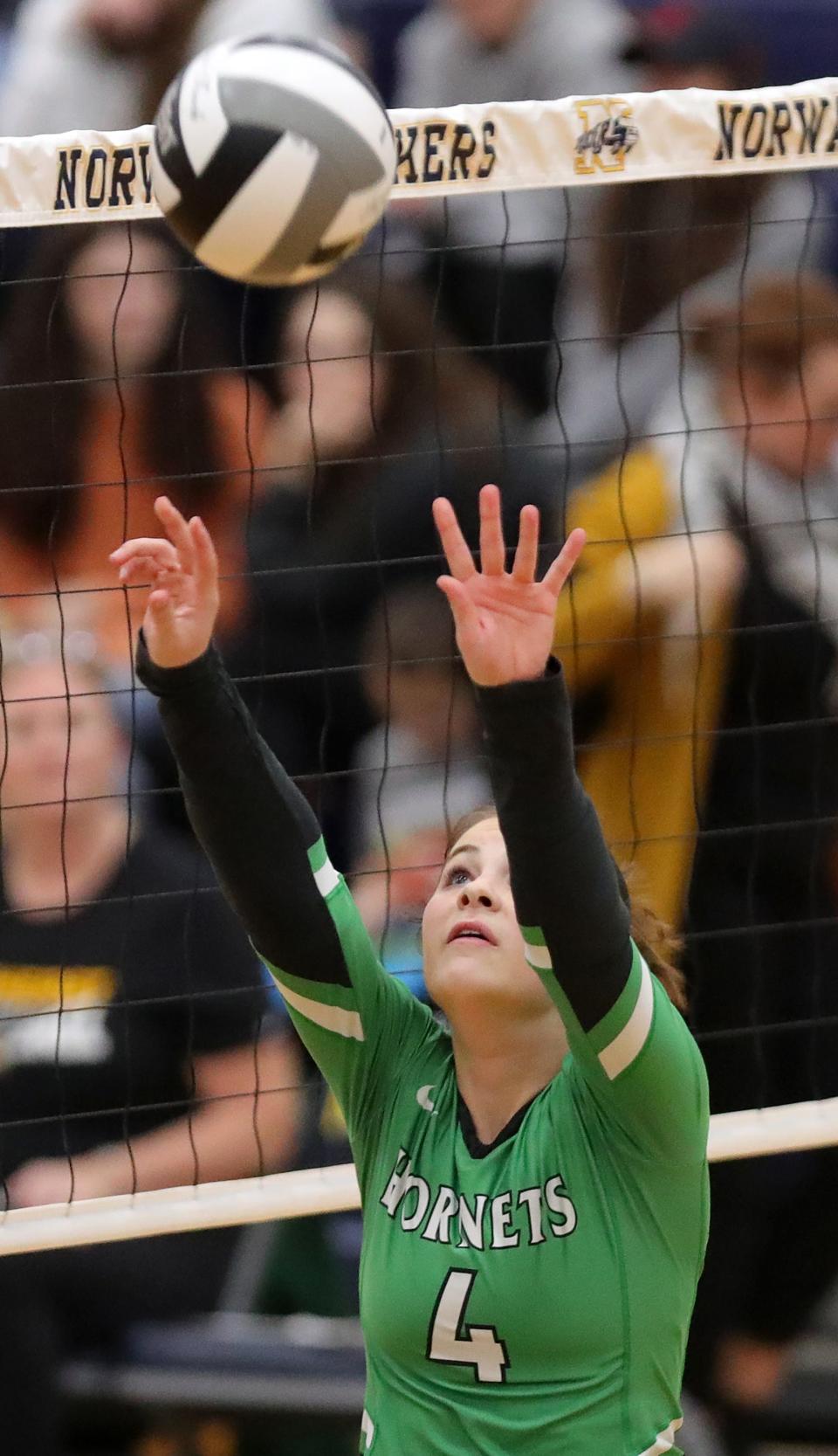 Highland's Megan Scavuzzo sets a ball for a teammate during the fourth set of a Division I regional volleyball semifinal against Amherst, Thursday, Nov. 3, 2022, in Norwalk, Ohio.
(Photo: Jeff Lange, Akron Beacon Journal)