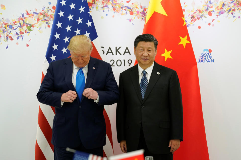 U.S. President Donald Trump and China's President Xi Jinping pose for a photo ahead of their bilateral meeting during the G20 leaders summit in Osaka, Japan, June 29, 2019. REUTERS/Kevin Lamarque