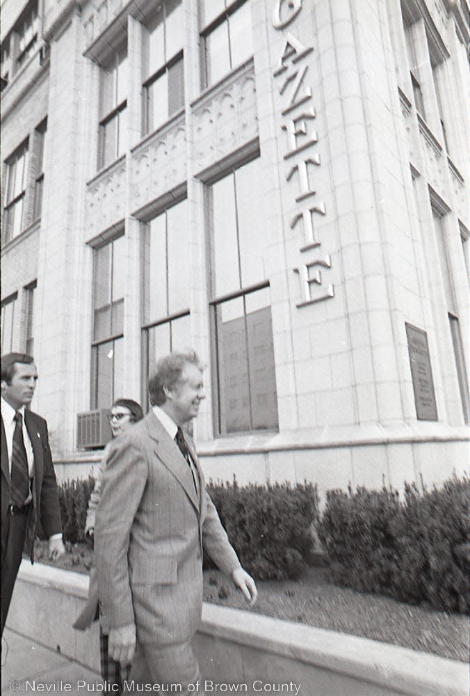 Jimmy Carter, then the former Georgia governor, walks down Walnut Street on March 26, 1976, during the primary campaign against U.S. Rep. Morris King Udall.