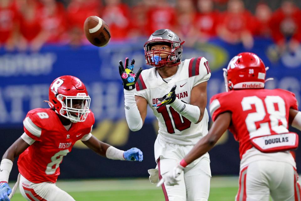 Destrehan's Daniel Blood (10) pulls in a pass as the Destrehan Wildcats face the Ruston Bearcats for the  Division I non-select Louisiana High School State Championship at the Superdome on Friday, December 9, 2022.  (Photo by Michael DeMocker)