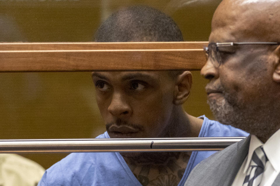 Eric Ronald Holder Jr., 29, who is accused of killing of rapper Nipsey Hussle, appears for arraignment with his Attorney Christopher Darden (R) on April 4, 2019 in Los Angeles, California. (Photo by Patrick Fallon-Pool/Getty Images)