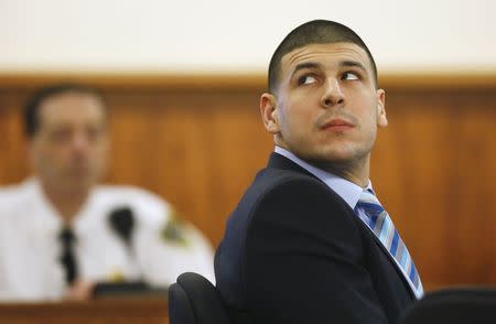 Former New England Patriots player Aaron Hernandez sits during his murder trial at the Bristol County Superior Court in Fall River, Massachusetts, March 5, 2015. REUTERS/Steven Senne/Pool