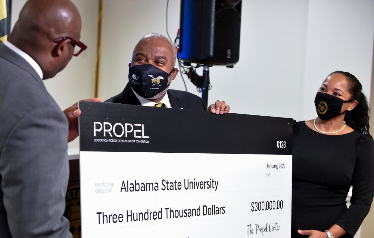Charles Gibbs, of The Propel Center, from left, Alabama State University President Quinton Ross and, assistant professor of Biology Michelle Samuel-Foo during an Impact Grant presentation on the ASU campus in Montgomery, Ala., on Friday January 21, 2022. 