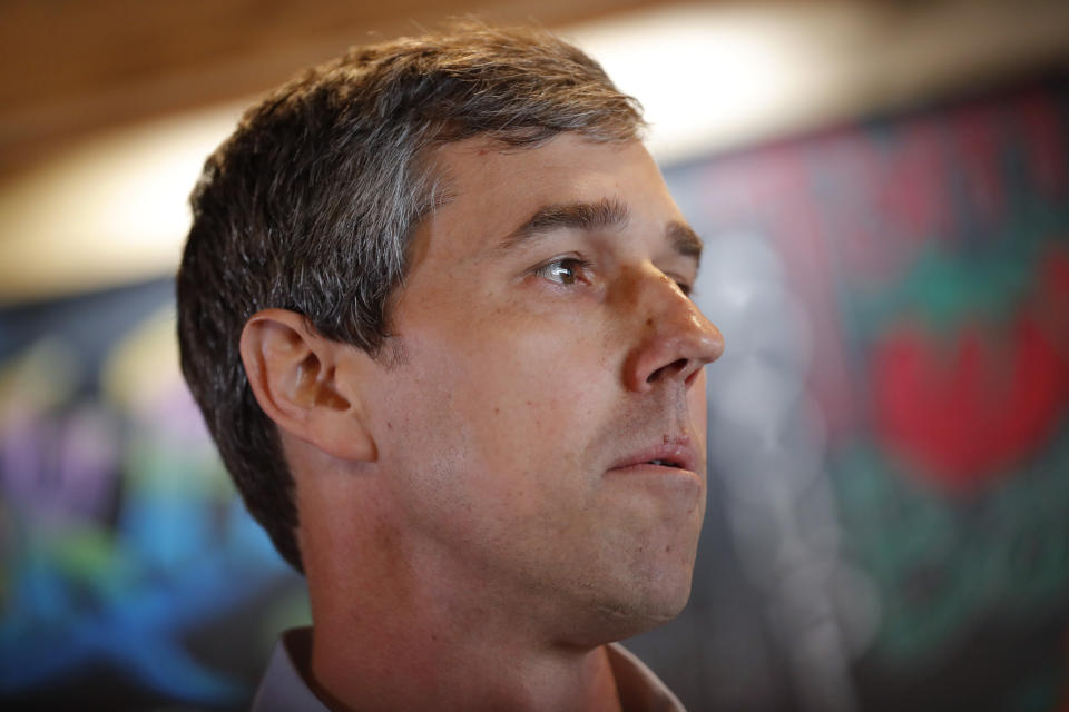 Former Texas congressman Beto O'Rourke speaks to local residents during a stop at the Central Park Coffee Company, Friday, March 15, 2019, in Mount Pleasant, Iowa. O'Rourke announced Thursday that he'll seek the 2020 Democratic presidential nomination. (AP Photo/Charlie Neibergall)