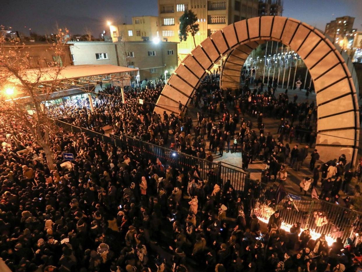 Iranians students demonstrate following a tribute for the victims of Ukraine International Airlines Boeing 737 in front of Tehran's Amirkabir University: Atta Kenare/AFP