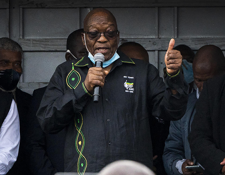 Former president Jacob Zuma addresses his supporters at his home in Nkandla, KwaZulu-Natal Natal Province, Sunday, July 4, 2021. The Constitutional Court will hear Zuma's urgent application on July 12 to rescind its order sentencing him to jail for 15 months for contempt of court. Zuma was initially supposed to hand himself over to authorities for his incarceration by Sunday. (AP Photo/Shiraaz Mohamed)