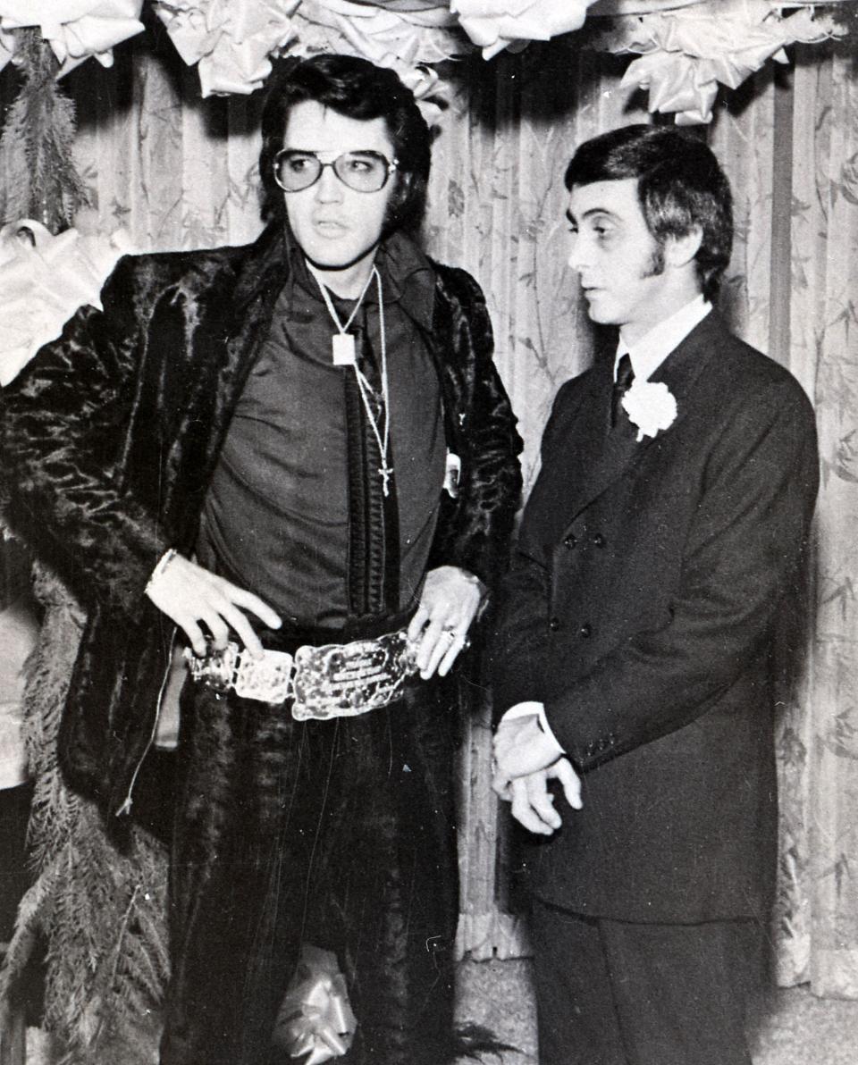 Dec. 5, 1970 - Elvis Presley stands with George Klein while serving as his best man at his wedding in Las Vegas.