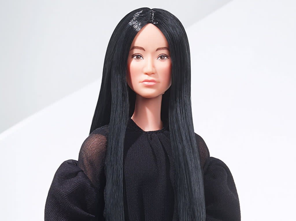 The doll is complete with Wang’s sleek black hair and dark fashion.  (Mattell)