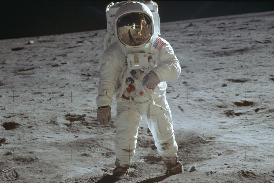 In this July 20, 1969 photo made available by NASA, astronaut Buzz Aldrin, lunar module pilot, walks on the surface of the moon during the Apollo 11 extravehicular activity. (Neil Armstrong/NASA via AP)