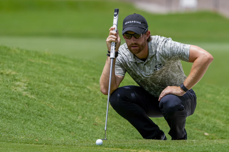 United States' Patrick Rodgers prepares to putt on the second green during the third round of the Australian Open Golf Championships at the Australian Golf Club in Sydney, Australia, Saturday, Dec. 2, 2023. (AP Photo/Mark Baker)