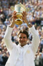<p>Federer claims his fifth consecutive championship title by beating Rafa Nadal in 2007 at Wimbledon </p>