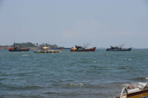 Fishing boats that have just returned from the disputed Scarborough shoal, are moored at Santa Cruz bay in May 2012. Southeast Asian leaders have clashed over how to handle tense maritime territorial disputes with China, overshadowing talks at a regional summit meant to strengthen trade and political ties