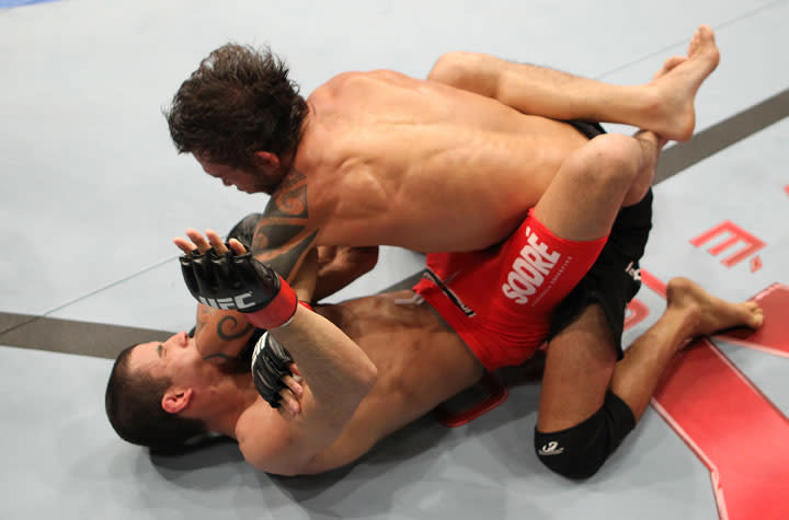 BELO HORIZONTE, BRAZIL - JUNE 23: (R-L) Milton Vieira delivers an elbow against Felipe Arantes during their UFC 147 featherweight bout at Estadio Jornalista Felipe Drummond on June 23, 2012 in Belo Horizonte, Brazil.