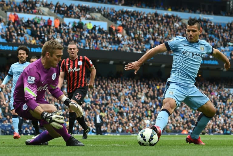 Manchester City's Sergio Aguero (R) is doubtful for the trip to the Britannia Stadium, but in line to play against Borussia Moenchengladbach in the Champions League next week