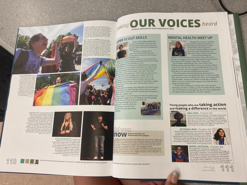 Photo of a high school yearbook open to spread about students protesting the "Don't Say Gay" bill.