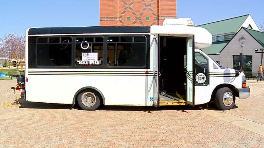 Cecil "CJ" Jackson, barber and owner of The Executive Cut in Grand Rapids brings a mobile barbershop to GVSU's Allendale Campus. (April 8, 2024)