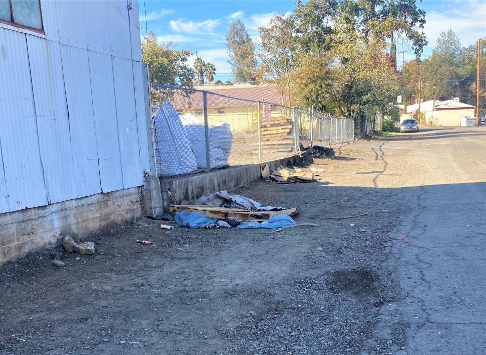 A woman was struck and killed by a semi-truck while camping in a tent alongside State Street in downtown Redding on Saturday night.