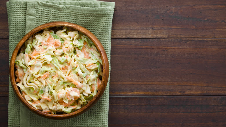 coleslaw in bown on wooden table