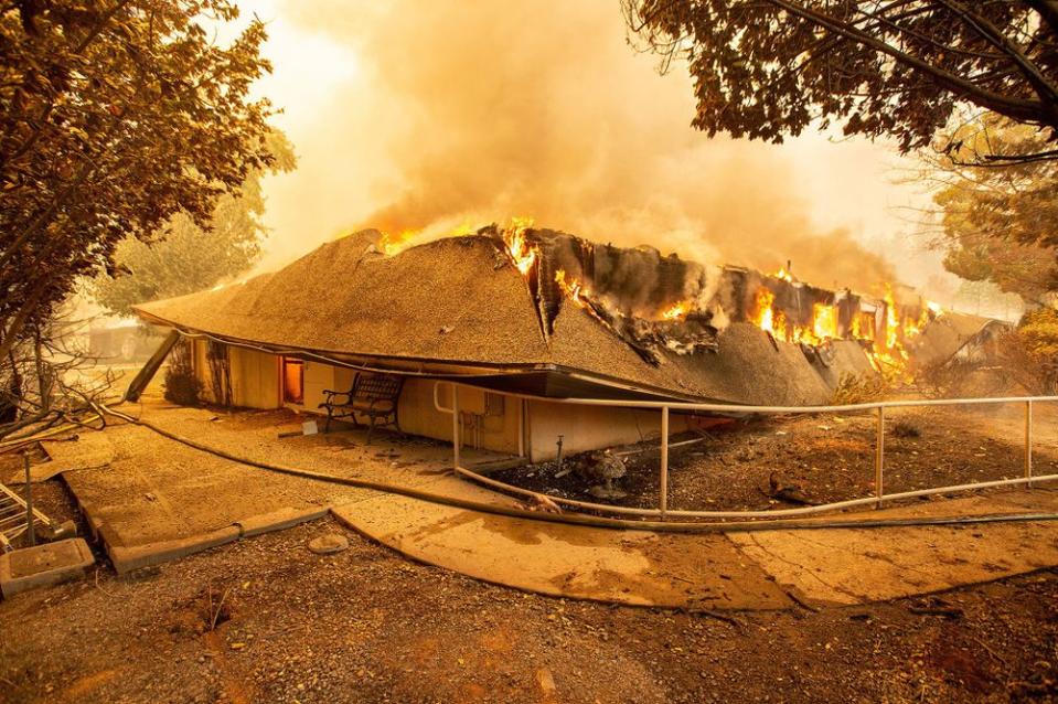 The Feather River Hospital burns down during the Camp Fire on Nov. 8 in Paradise, California