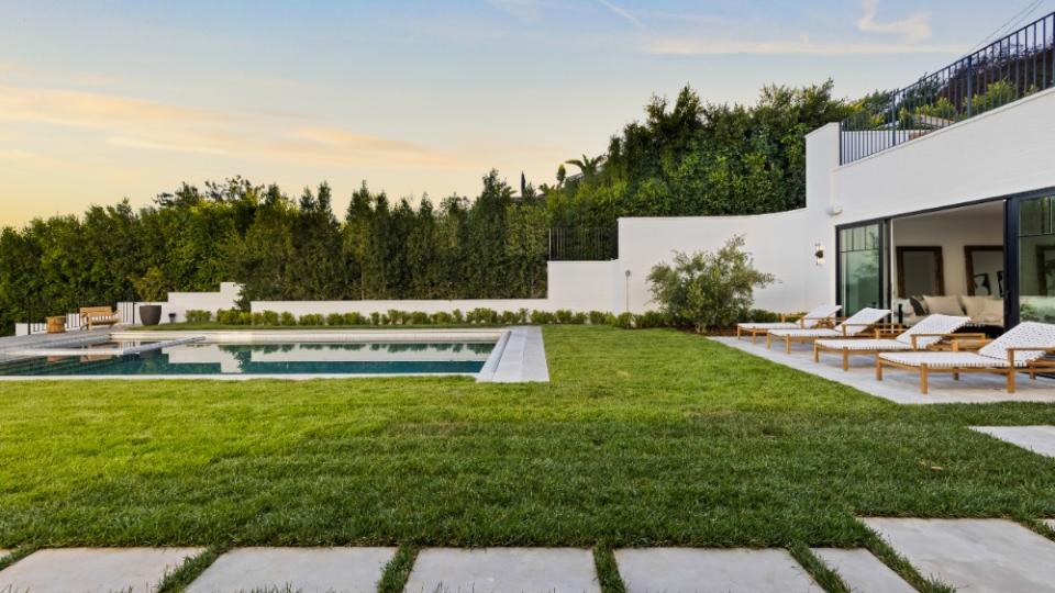 The backyard featuring the pool - Credit: Christopher Amitrano and Joe Bryant