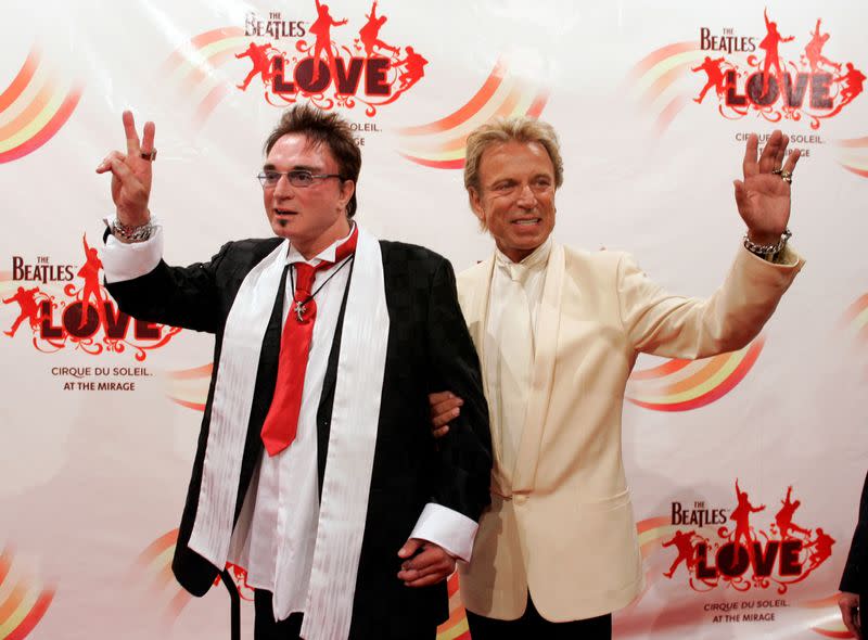 FILE PHOTO: Magicians Horn and Fischbacher pose after attending gala premiere of "The Beatles LOVE by Cirque du Soleil" in Las Vegas