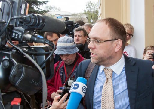 Serhiy Vlasenko, lawyer of Yulia Tymoshenko, talks to journalists at the court building in Ukrainian city of Kharkiv prior to the opening of her latest trial on Thursday. The flamboyant but divisive 2004 Orange Revolution leader faces tax evasion and embezzlement charges relating to the time she spent leading a state power provider in the 1990s at the onset of her dramatic political career