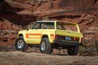 <p>What casual observers might not expect with this vintage Jeep Cherokee is that it's a plug-in hybrid. That's right. It's been outfitted with the Wrangler's available 4xe powertrain, which pairs two electric motors with a turbocharged 2.0-liter four-cylinder. A couple clues to its hybrid nature are the blue front and rear tow hooks.</p>