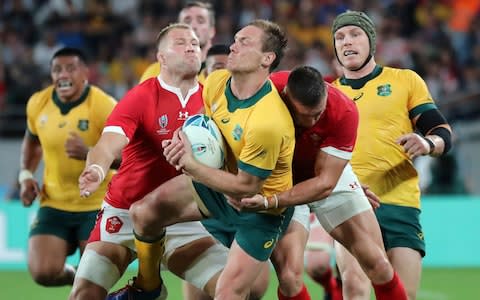 Australia's Dane Haylett-Petty catches the ball during the Rugby World Cup Pool D game at Tokyo Stadium between Australia and Wales - Credit: AP