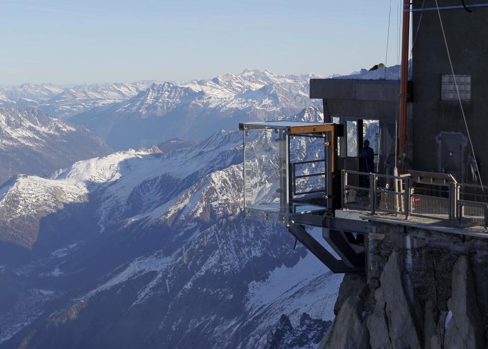 View of the 'Step into the Void' installation at the Aiguille du Midi mountain peak above Chamonix, in the French Alps