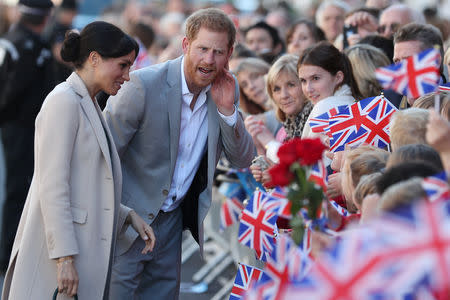 Britain's Prince Harry, and Meghan, Duchess of Sussex greet well-wishers as they arrive for a visit to Edes House, in Chichester, Britain October 3, 2018. Daniel Leal-Olivas/pool via Reuters