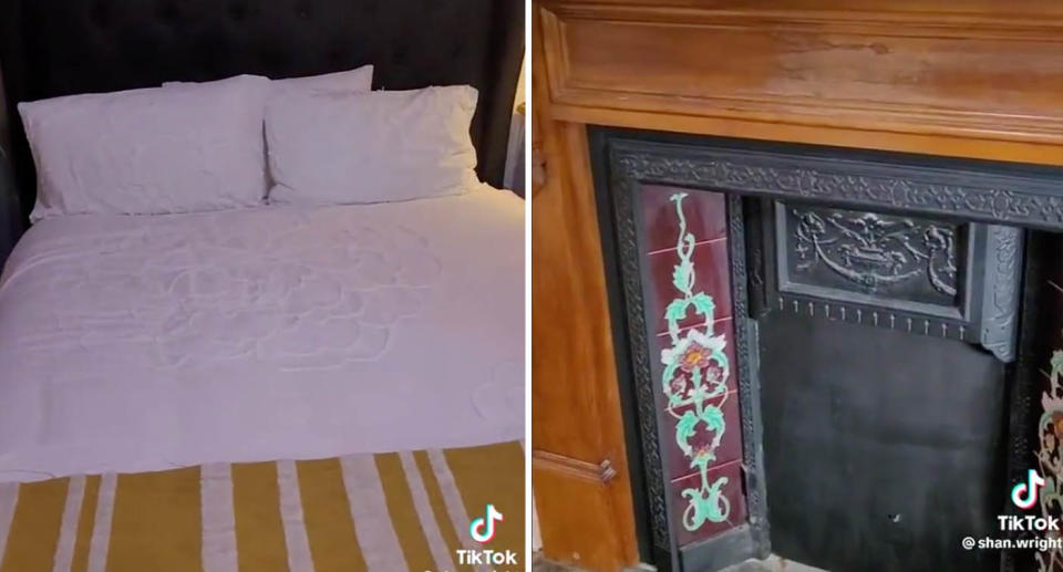 Double bed with white bedsheets and fireplace inside Airbnb bedroom. 