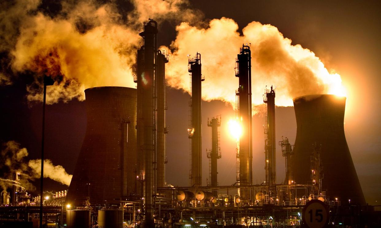 <span>Gas is flared at the Ineos-owned Grangemouth oil refinery.</span><span>Photograph: Murdo Macleod/The Guardian</span>