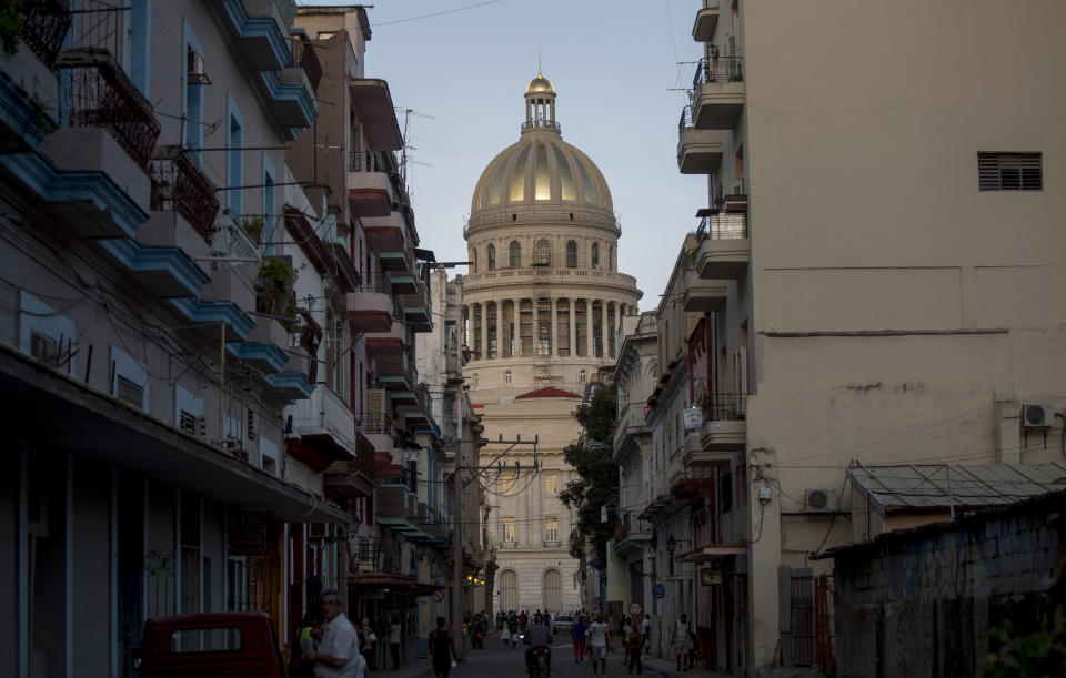 The Capital building, with its dome recently restored by Russian specialists, stands in Havana, Cuba, Wednesday, Oct. 23, 2019. Russia is making no secret of its desire to play reliable partner to an island facing hostility from the United States. (AP Photo/Ismael Francisco)