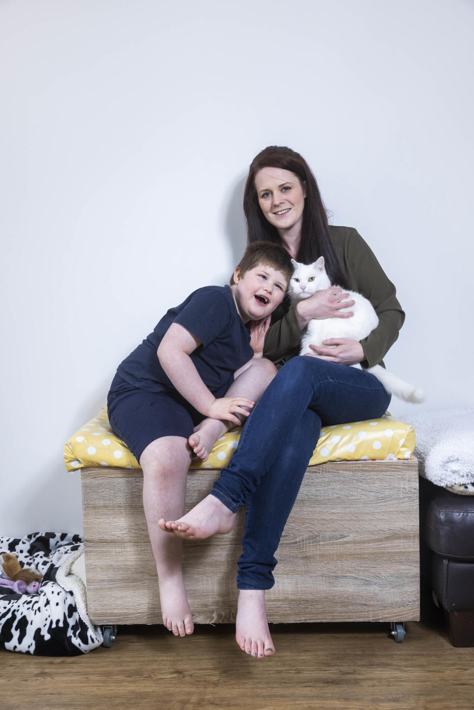 Minty the cat with mum Siobhan Cobb and son Connor Raven, age 6 for Cats Protections National Cat Awards