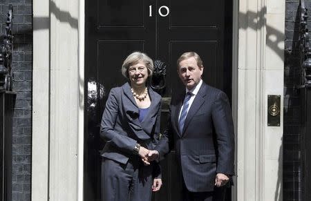 Britain's Prime Minister Theresa May (L) poses for the media with Ireland's Taoiseach Enda Kenney in Downing Street in London, Britain June 26, 2016. REUTERS/Neil Hall