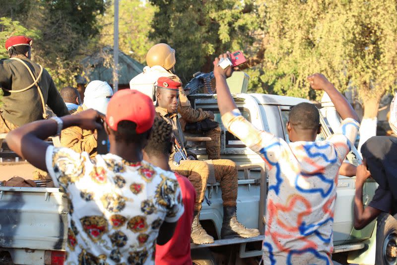 FILE PHOTO: People show their support for the military after they deposed President Kabore, in Ouagadougou