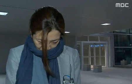 Cho Hyun-min, a senior vice president at Korean Air Lines and a daughter of its chairman Cho Yang-ho, arrives at Incheon International Airport in Incheon, South Korea, in this still image from MBC exclusive news report footage obtained by Yonhap on April 15, 2018. MBC footage/Yonhap via REUTERS