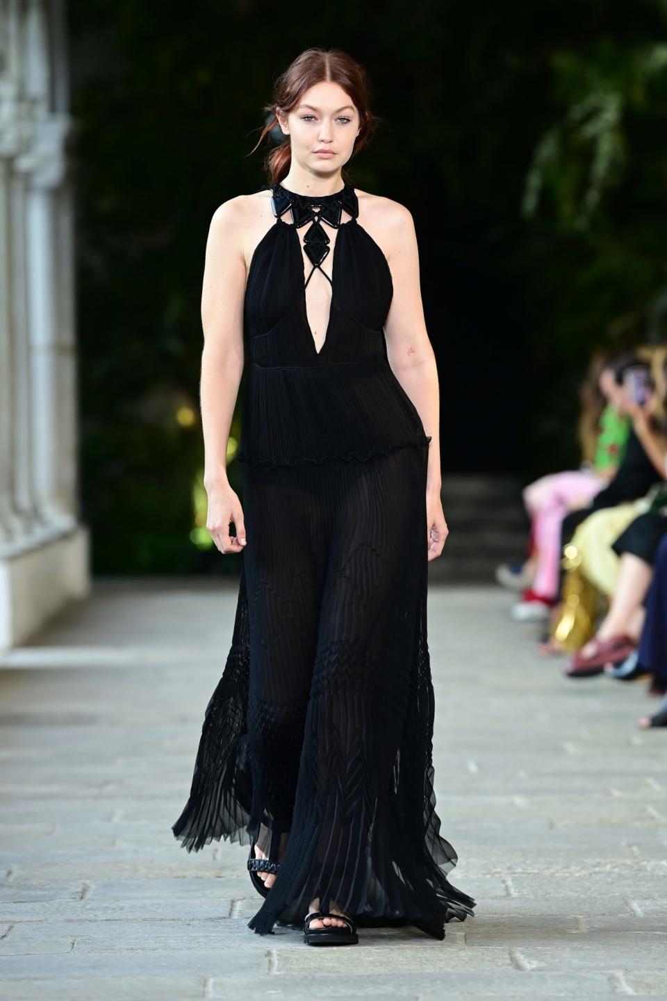<p>Gigi Hadid walks the runway at the Alberta Ferretti fashion show during Milan Fashion Week in Italy on Sept. 22. </p>