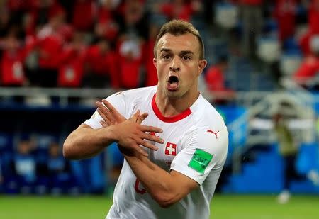 Soccer Football - World Cup - Group E - Serbia vs Switzerland - Kaliningrad Stadium, Kaliningrad, Russia - June 22, 2018 Switzerland's Xherdan Shaqiri celebrates scoring their second goal REUTERS/Gonzalo Fuentes